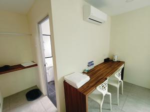 Imagen de la galería de 德古鲁民宿, en Bagan Teluk Ru