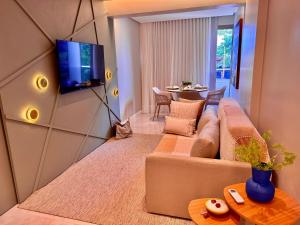 TV a/nebo společenská místnost v ubytování Refúgio das ondas - BeachClass Ondina