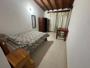 Letto o letti in una camera di Casa Lisieux- Jericó
