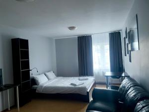 Postel nebo postele na pokoji v ubytování Central Hostel Jelgava