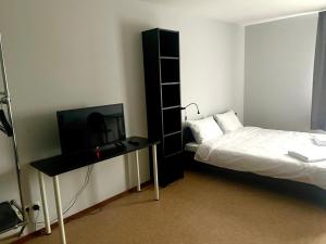 Postel nebo postele na pokoji v ubytování Central Hostel Jelgava