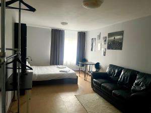 Postel nebo postele na pokoji v ubytování Central Hostel Jelgava