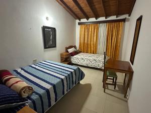 Letto o letti in una camera di Casa Lisieux- Jericó