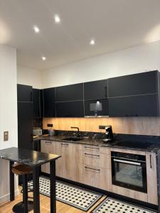 Cucina o angolo cottura di Le Royal XIX Dinard vue mer luxe