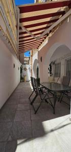 A balcony or terrace at APTO TANEZ TORREMOLINOS, a