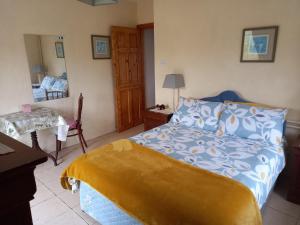 Ένα ή περισσότερα κρεβάτια σε δωμάτιο στο Christmas in Connemara! Grallagh house Dog paradise