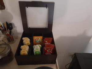 a black box filled with different types of food at Double room in Villa Narges New Cairo in Cairo