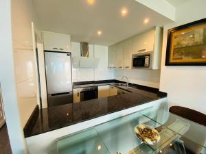 A kitchen or kitchenette at Mar Azul by Alina365