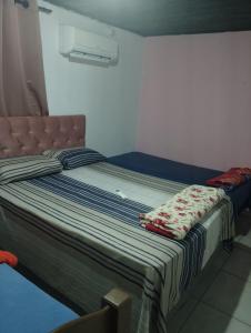 Ένα ή περισσότερα κρεβάτια σε δωμάτιο στο casa Fran