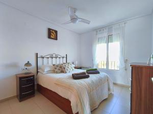 A bed or beds in a room at A beautiful pool view apartment - AO1822LT