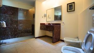 Ein Badezimmer in der Unterkunft Hotel Xperience
