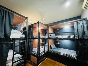 Postel nebo postele na pokoji v ubytování Empire Hostel Regalia