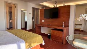 Ein Bett oder Betten in einem Zimmer der Unterkunft Hotel Xperience
