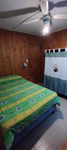 Ένα ή περισσότερα κρεβάτια σε δωμάτιο στο Casa centrica con pileta