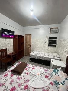 Postel nebo postele na pokoji v ubytování Hotel Granada Concept