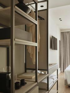 Una cama o camas en una habitación de Doryssa Lithos Hotel