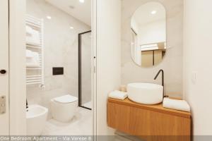 Kúpeľňa v ubytovaní Brera Apartments in Moscova + 37 fotografií