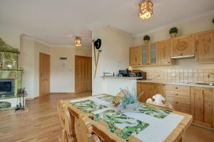Kuchyňa alebo kuchynka v ubytovaní Apartment Tatrachata