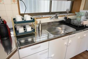 Η κουζίνα ή μικρή κουζίνα στο Shinjuku 20mins, spacious 125sqm house, 2baths, BBQ +41 φωτογραφίες