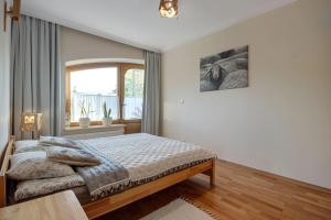 Posteľ alebo postele v izbe v ubytovaní Apartment Tatrachata