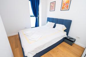 Ένα ή περισσότερα κρεβάτια σε δωμάτιο στο Central Cozy LOFT