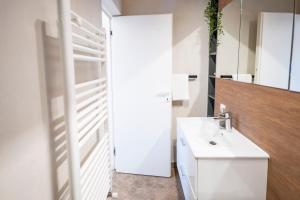 Ένα μπάνιο στο Central Cozy LOFT