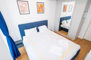 Ένα ή περισσότερα κρεβάτια σε δωμάτιο στο Central Cozy LOFT