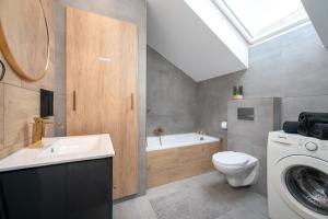 Kúpeľňa v ubytovaní Kościelna Loft Apartaments