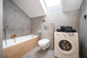 Kúpeľňa v ubytovaní Kościelna Loft Apartaments