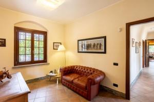 Posezení v ubytování Paradise Lodge - Capitol Lifestyle Villas