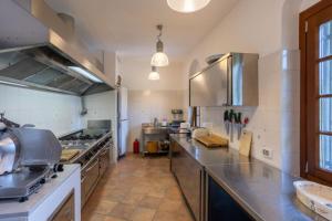 Kuchyň nebo kuchyňský kout v ubytování Paradise Lodge - Capitol Lifestyle Villas + 31 fotografií