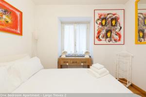 Posteľ alebo postele v izbe v ubytovaní Brera Apartments in San Marco