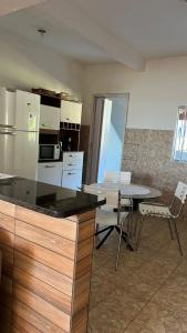 Nhà bếp/bếp nhỏ tại Pé na areia Beach House