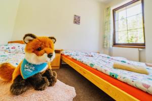 Posteľ alebo postele v izbe v ubytovaní Penzion Šumavous