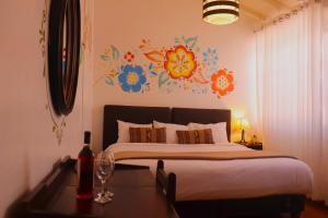 Postel nebo postele na pokoji v ubytování Cusco Lodge Hotel Boutique