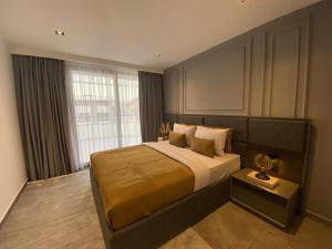 Katil atau katil-katil dalam bilik di Nordic Art - Premium apartment by the sea +31 gambar