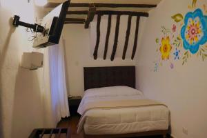Postel nebo postele na pokoji v ubytování Cusco Lodge Hotel Boutique