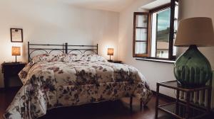 Posteľ alebo postele v izbe v ubytovaní Albergo Giovanni Da Verrazzano