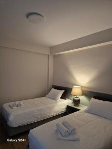 Postel nebo postele na pokoji v ubytování Hotel Asa