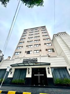 a building with a sign on the front of it at Condado Hotel Casino Goya in Goya