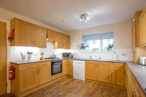 Køkken eller tekøkken på Honeybee Cottage