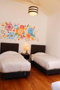 Postel nebo postele na pokoji v ubytování Cusco Lodge Hotel Boutique