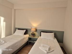 Postel nebo postele na pokoji v ubytování Hotel Asa