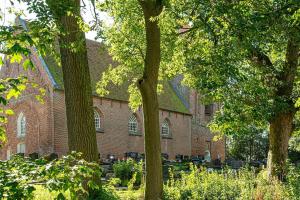Κήπος έξω από το Ferienhaus Lille Huus in Hinte bei Emden