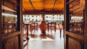 Reštaurácia alebo iné gastronomické zariadenie v ubytovaní Albergo Giovanni Da Verrazzano
