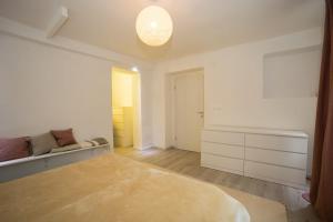 Ένα ή περισσότερα κρεβάτια σε δωμάτιο στο Comfort Suite Jelenovac +16 φωτογραφίες