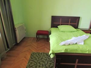 Postel nebo postele na pokoji v ubytování Guest House Nona
