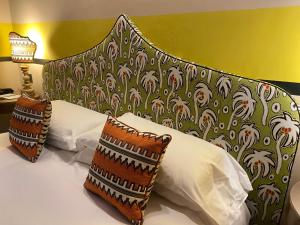 Postel nebo postele na pokoji v ubytování Hotel Hermitage