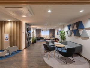 Posezení v ubytování Holiday Inn Express - Hamburg South A7-AS42 by IHG