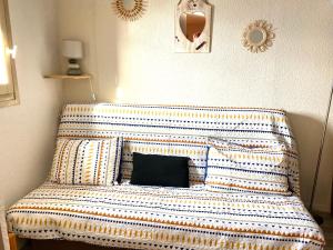 Giường trong phòng chung tại Appart 3 Chambres - 8 pers - AU PIED DES PISTES